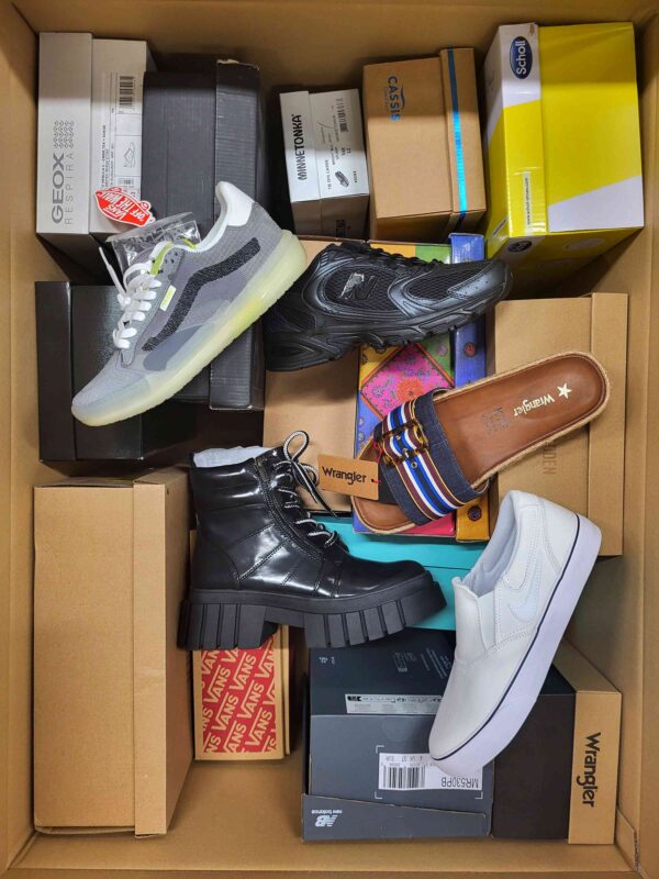 The photo shows a package with footwear in the category AS.