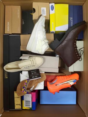 The photo shows a package with footwear in the category AS.