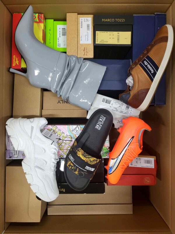 The photo shows a package with footwear in the category AS.
