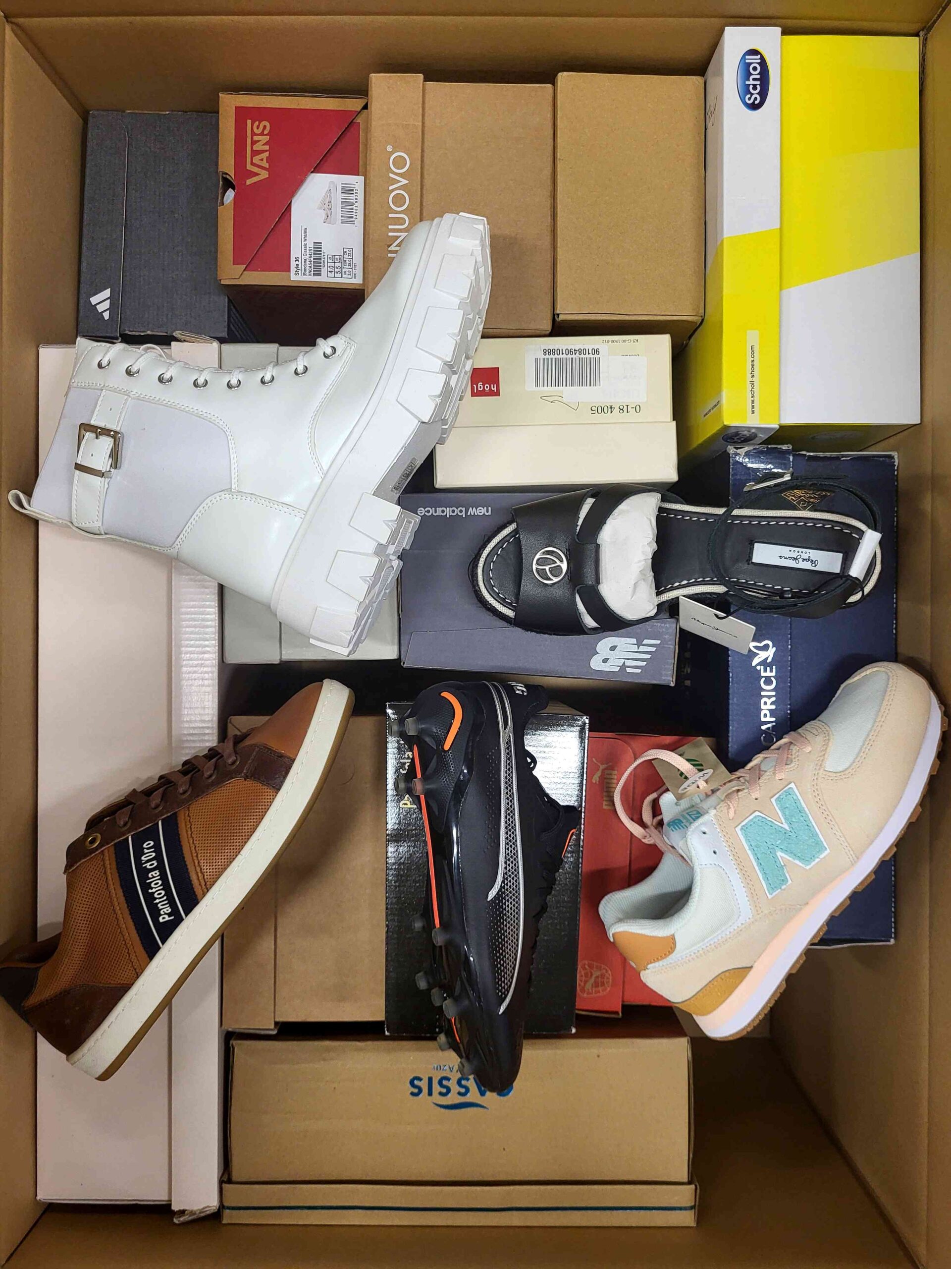 The photo shows a package with footwear in the category AS.