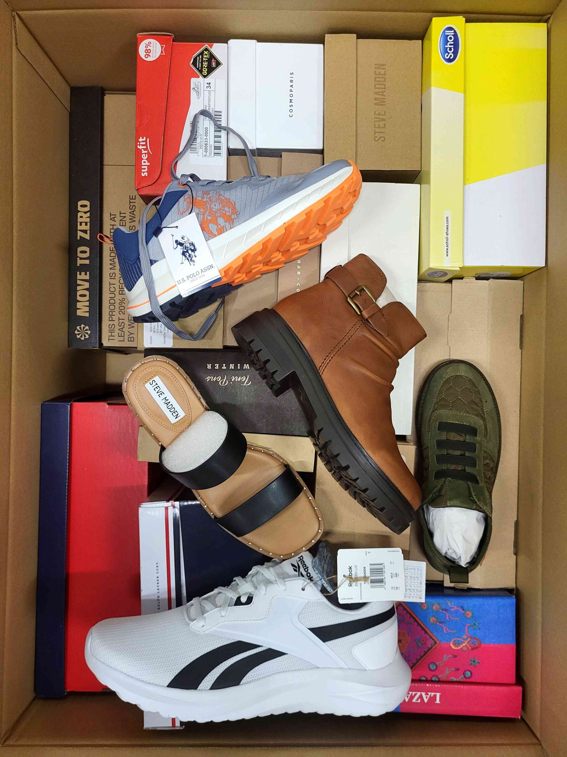 The photo shows a package with footwear in the category AS.