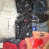 The photo shows a package with clothing in the category B.
