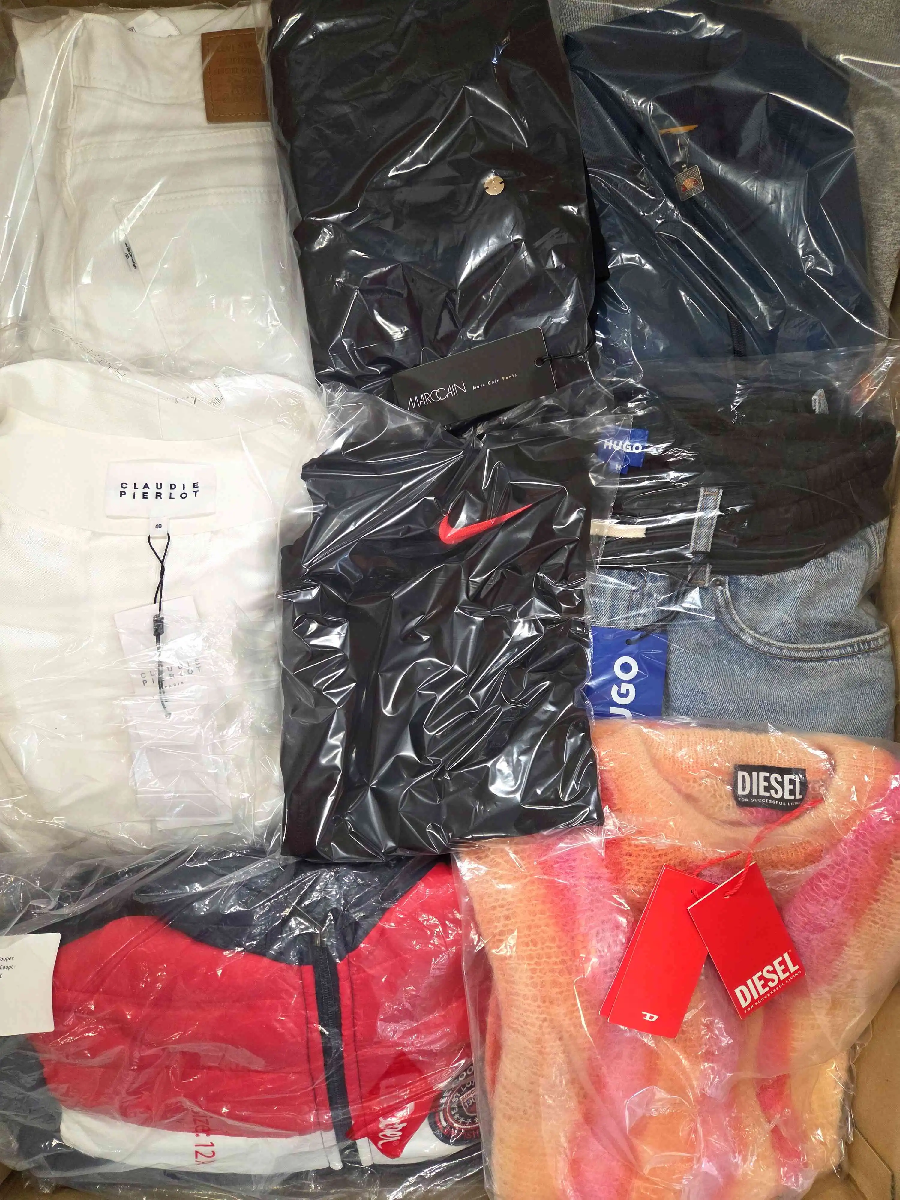 The photo shows a package with clothing in the category B.