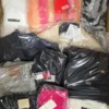 The photo shows a package with clothing in the category B.
