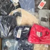The photo shows a package with clothing in the category B.