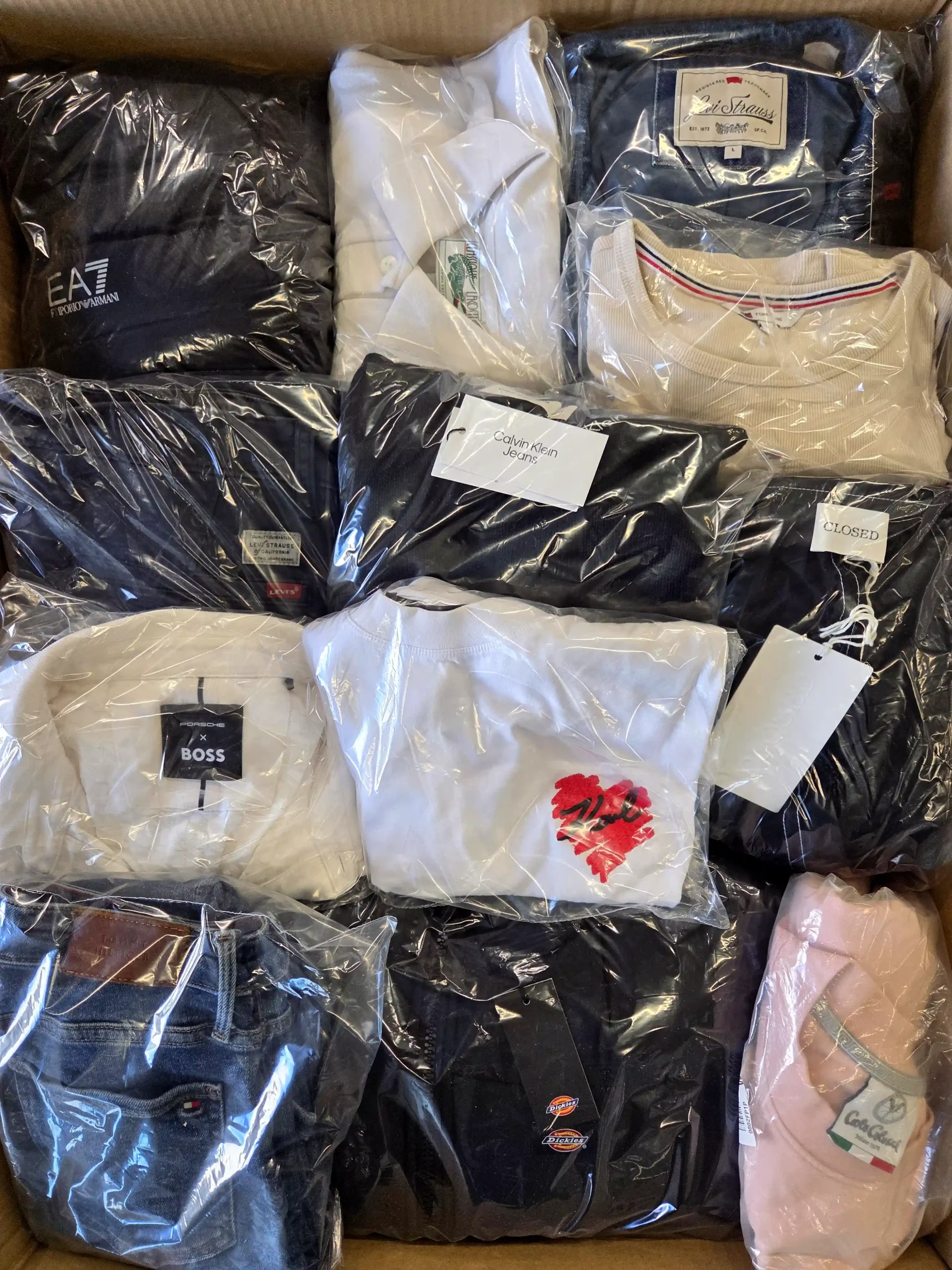 The photo shows a package with clothing in the category C.