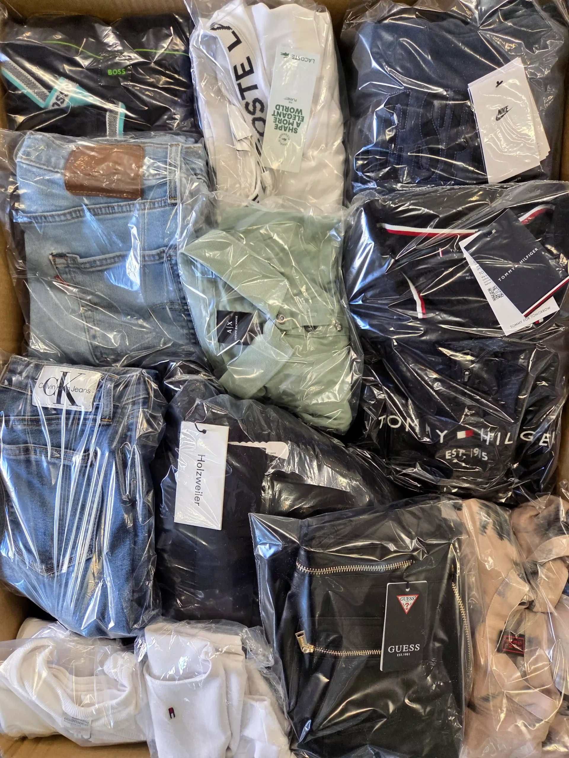 The photo shows a package with clothing in the category C.