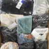 The photo shows a package with clothing in the category C.