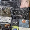 The photo shows a package with clothing in the category C.