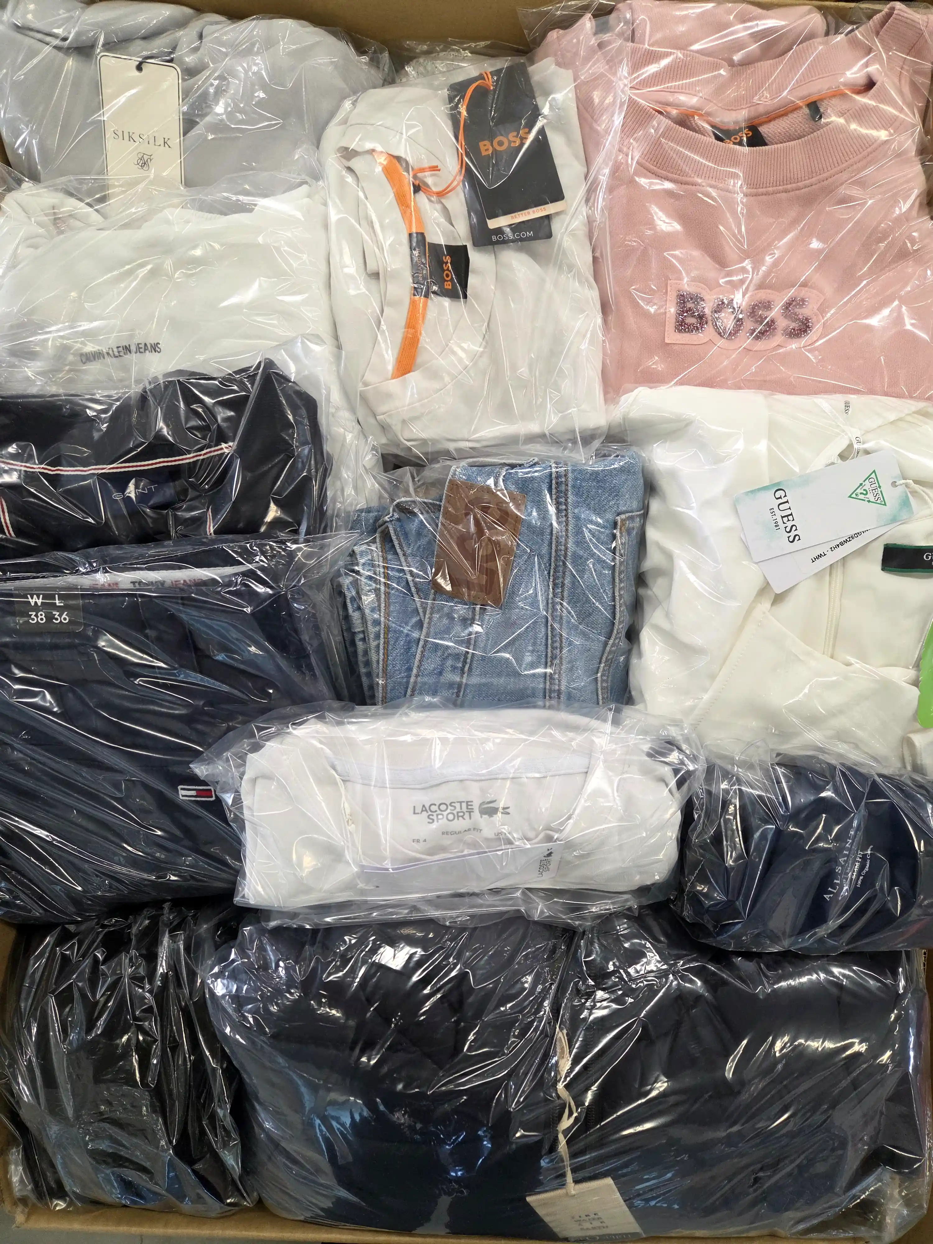 The photo shows a package with clothing in the category C.