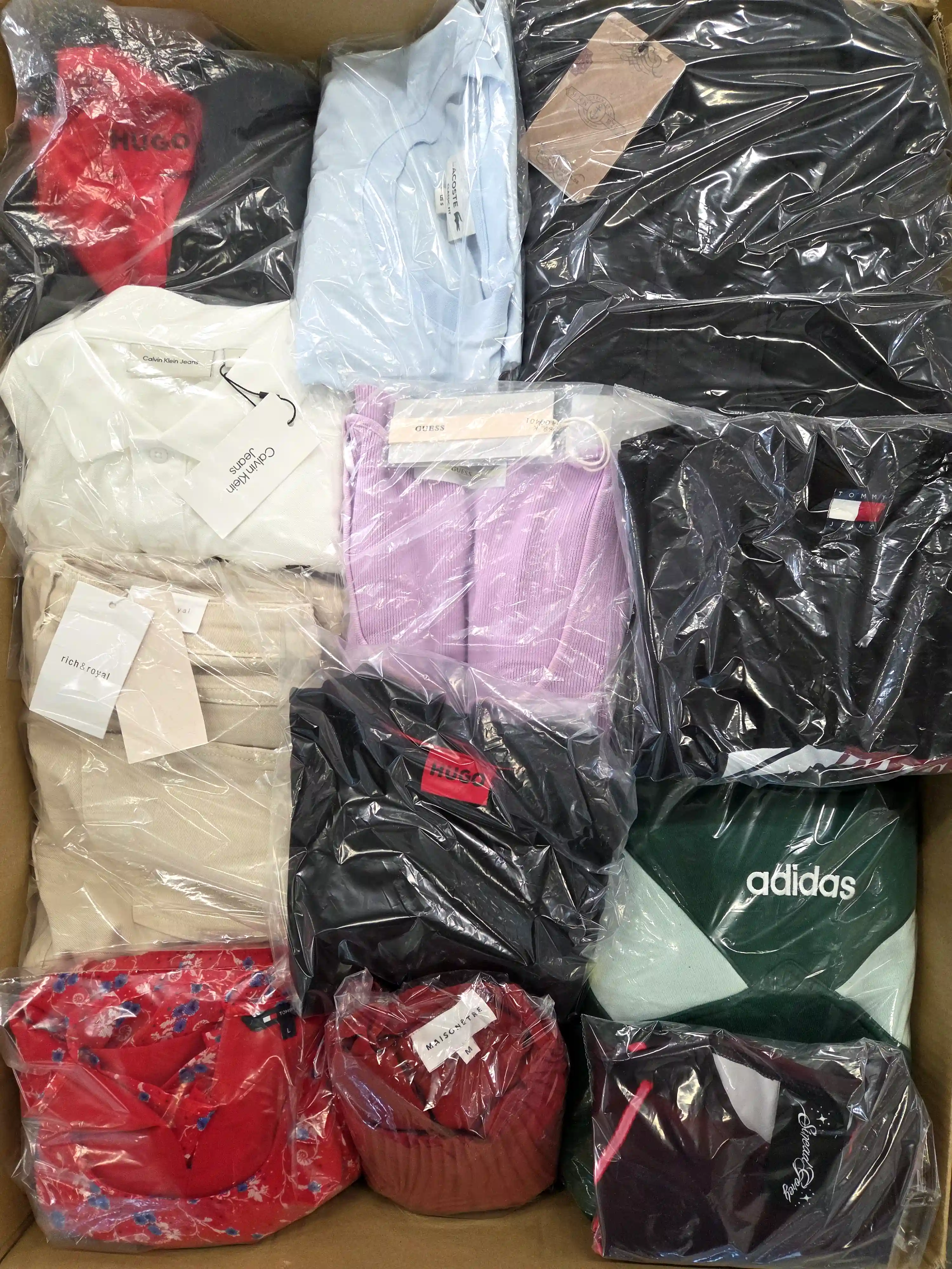 The photo shows a package with clothing in the category C.
