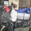 The photo shows a package with clothing in the category C.