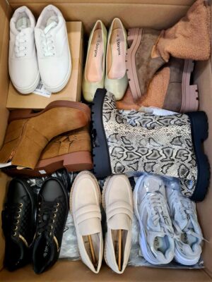 The photo shows a package with clothing in the category BPS.