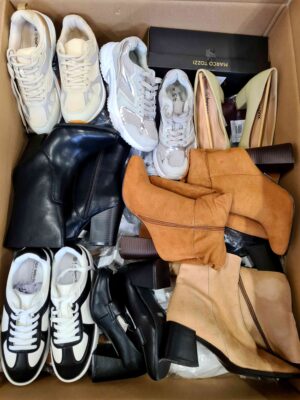 The photo shows a package with clothing in the category BPS.