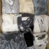 The photo shows a package with clothing in the category B.