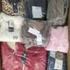 The photo shows a package with clothing in the category B.