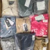The photo shows a package with clothing in the category B.