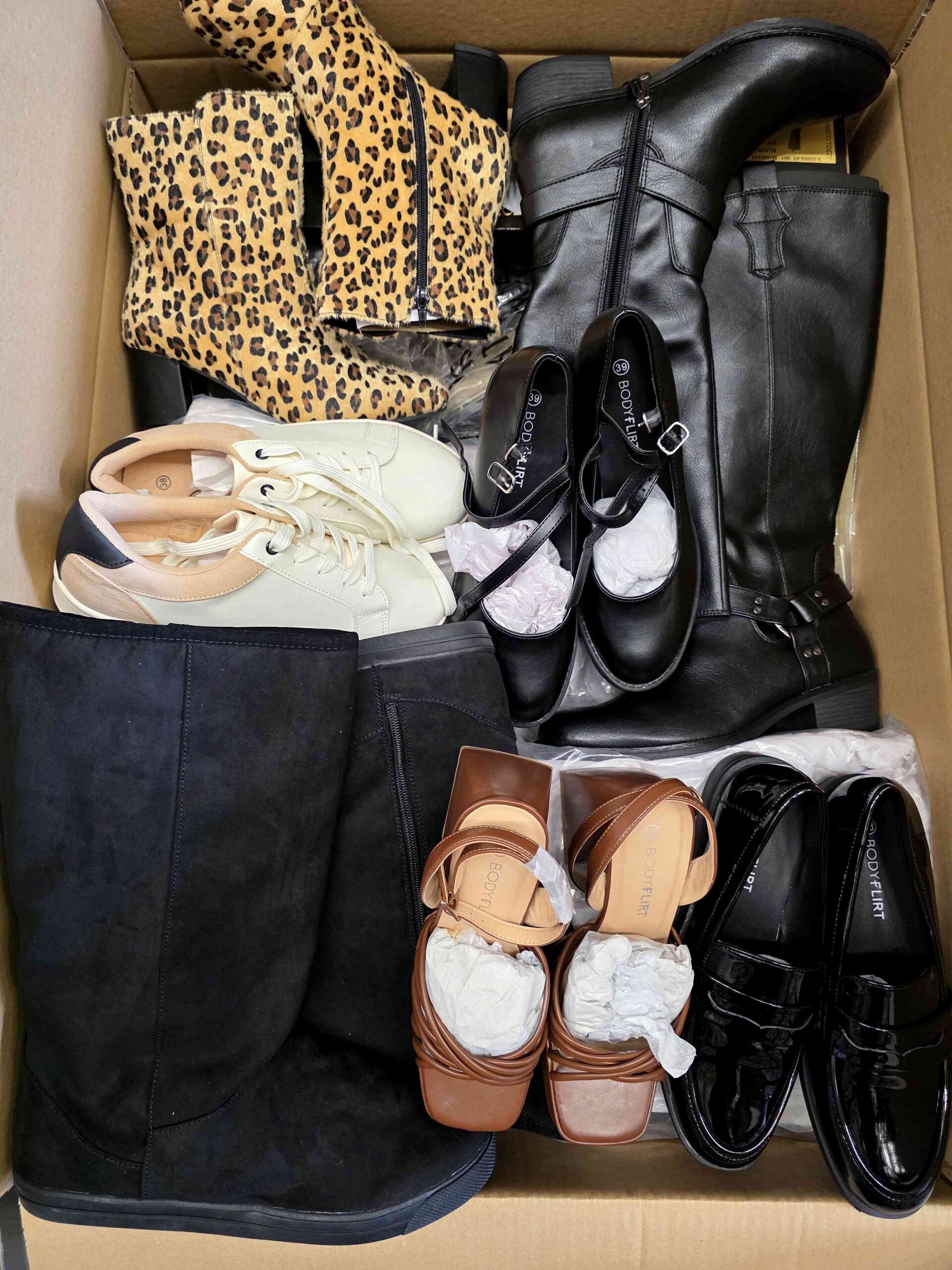 The photo shows a package with clothing in the category BPS.