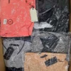 The photo shows a package with clothing in the category BB.