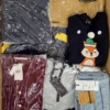 The photo shows a package with clothing in the category BB.