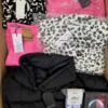 The photo shows a package with clothing in the category BB.
