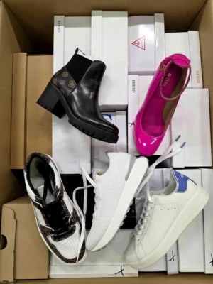 The photo shows a package with footwear in the category BS.