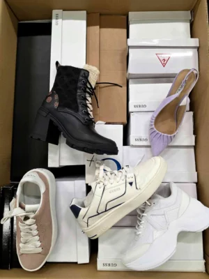 The photo shows a package with footwear in the category BS.