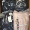 The photo shows a package with clothing in the category AJW.