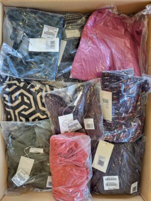 The photo shows a package with clothing in the category YA.