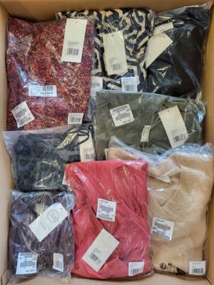 The photo shows a package with clothing in the category YA.