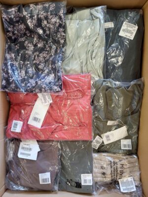 The photo shows a package with clothing in the category YA.