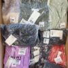 The photo shows a package with clothing in the category YA.