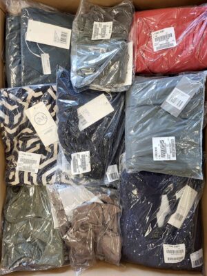 The photo shows a package with clothing in the category YA.