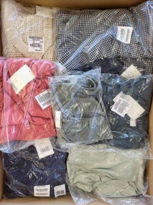 The photo shows a package with clothing in the category YA.