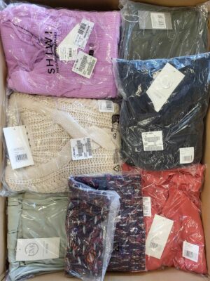 The photo shows a package with clothing in the category YA.