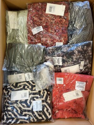 The photo shows a package with clothing in the category YA.