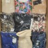 The photo shows a package with clothing in the category BB.