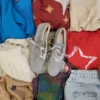 The photo shows a package with clothing in the category SN.