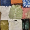 The photo shows a package with clothing in the category SN.