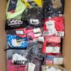 The photo shows a package with clothing in the category ABW.