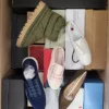 The photo shows a package with footwear in the category AS.