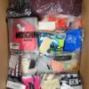 The photo shows a package with clothing in the category ABW.