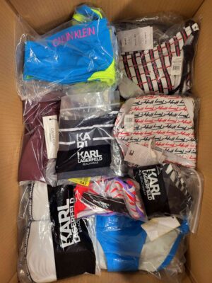 The photo shows a package with clothing in the category ABW.