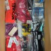 The photo shows a package with clothing in the category ABW.