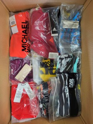 The photo shows a package with clothing in the category ABW.