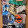 The photo shows a package with clothing in the category ABW.