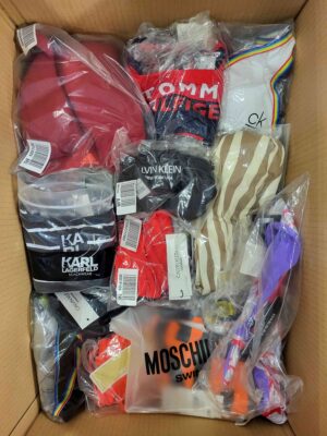 The photo shows a package with clothing in the category ABW.