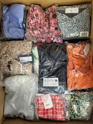 The photo shows a package with clothing in the category AR.