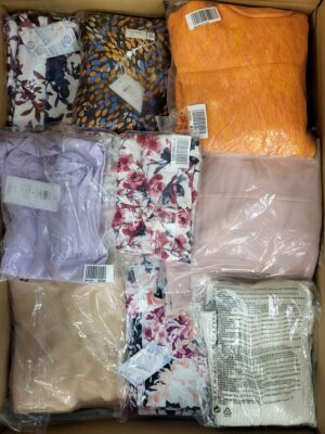 The photo shows a package with clothing in the category AR.