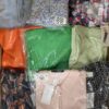 The photo shows a package with clothing in the category AR.